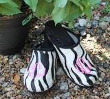 Zebra Fur Clogs With A Hot Pink Diamond  . . . 