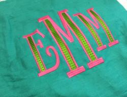 This is a larger 2 color font called Deco.  Deco on Green Pillow NULL