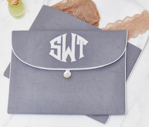 Medium and Large lingerie envelopes in grey smooth linen with white Oval appliqué Medium and Large lingerie envelopes in grey smooth linen with white Oval appliqué NULL