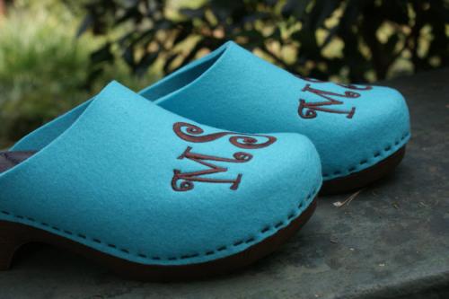 Monogrammed Turquoise Wool Clogs on brown flex heels Monogrammed Turquoise Wool Clogs side by side 